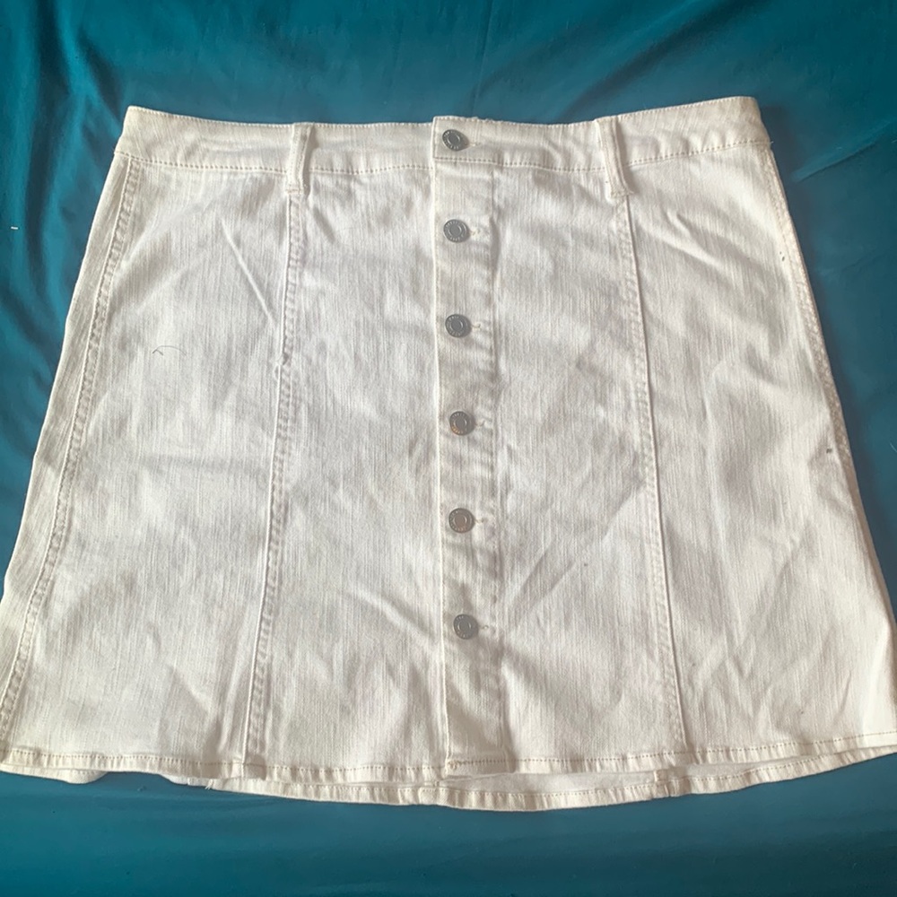 white straight line skirt with buttons